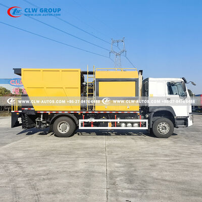 Sinotruk HOWO 4x2 Synchronous Chip Sealer with PLC Control and Large Insulated Asphalt Tank for Durable Pavement Preservation